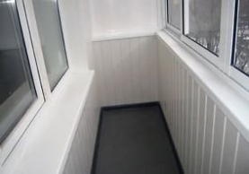 Отделка балкона пластиковыми панелями при холодном остеклении